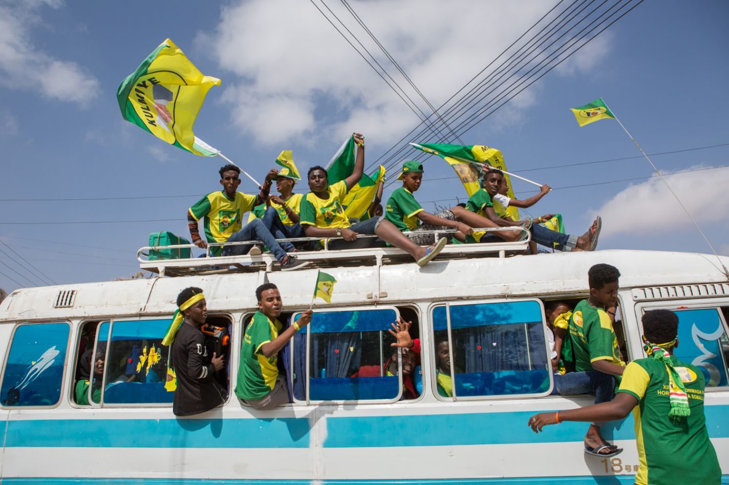 Supporters on a bus during a campaign rally